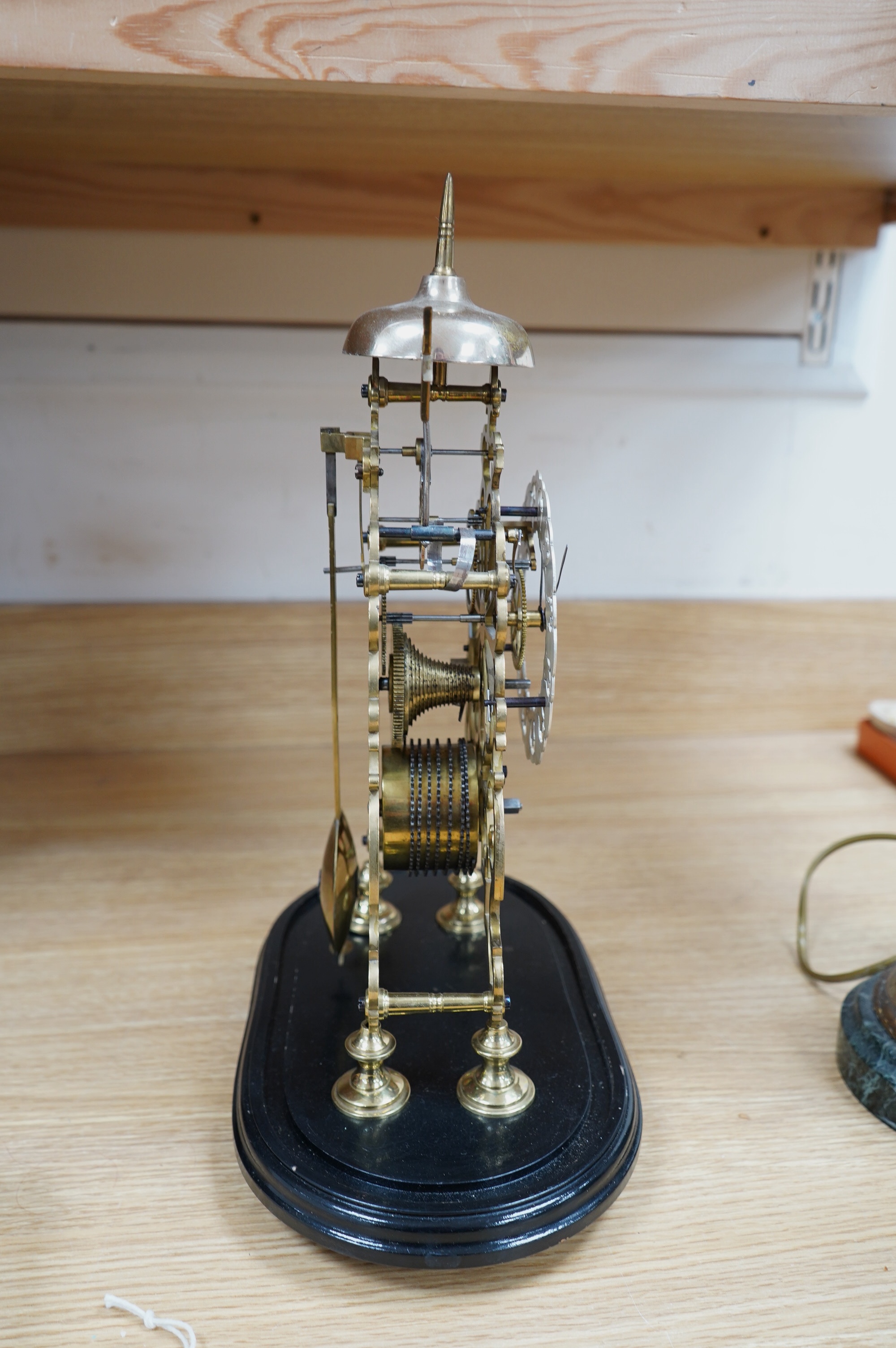 A Victorian brass single fusee passing strike skeleton clock, with pendulum, lacking dome and key, 39cm. Condition - good, not tested